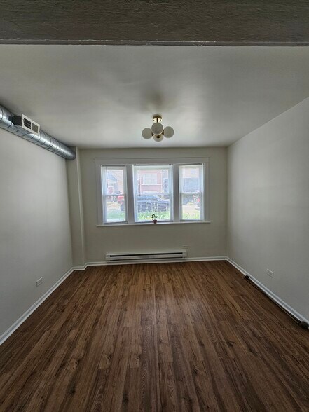 Building Photo - 2125 N Lorel Ave