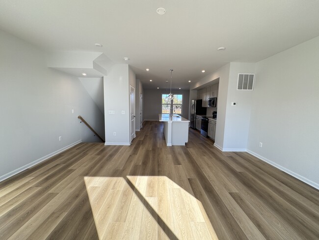 view of open layout, with kitchen island - 5977 Cling Ln