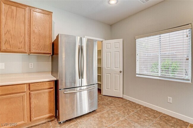 Building Photo - 9060 Candyland Ave