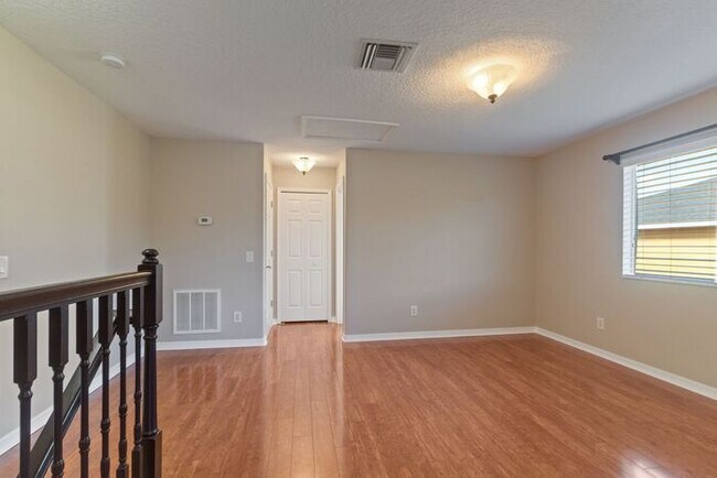 Building Photo - Executive Living Waits!