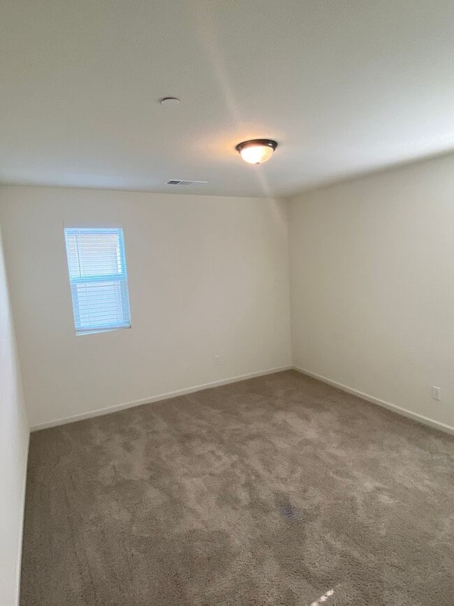 Building Photo - Almost new! Gated 4 Bdrm, 2.5 Bath Solar Home