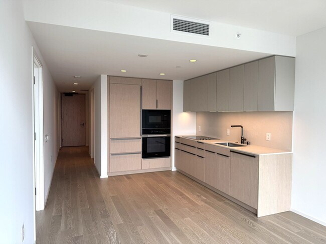 Building Photo - The Park Ward Village - One bedroom, one bath, one assigned parking stall - Pet Friendly!