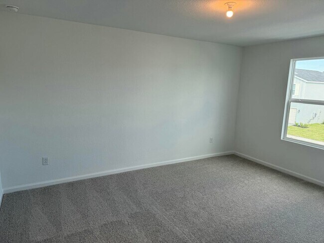 Building Photo - 5892 NW Sweetwood Dr