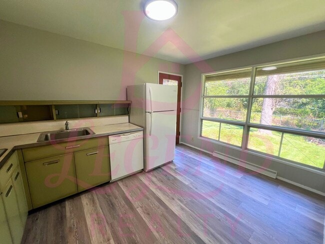 Building Photo - Spacious & Charming 3-Bedroom, 2-Bath Home...