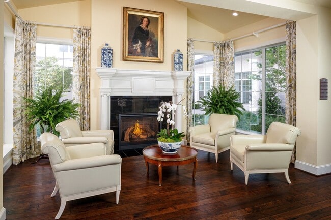 Sitting area by wood buring fire place - The Tradition-Buffalo Speedway