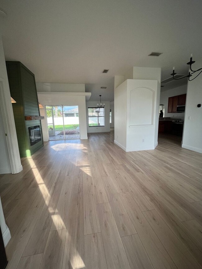 Building Photo - Convenient 3/2/2 PSL Home with Backyard Oa...