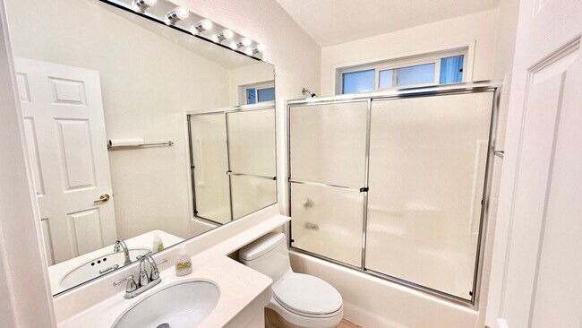 Building Photo - Light, Bright, and Freshly Updated Home in the Gated & Desirable Champagne Village 55+ Community!