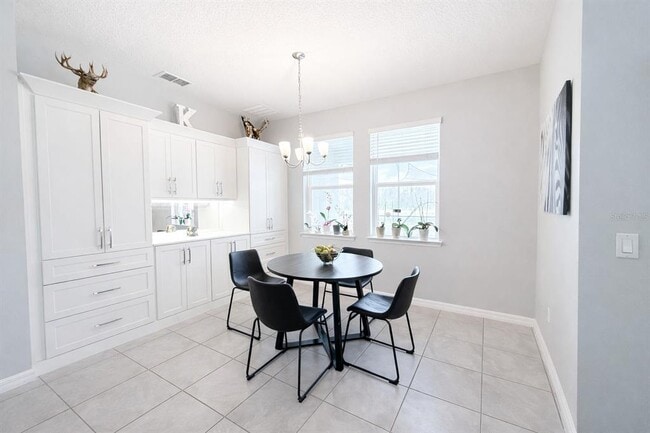 Building Photo - 4054 Pindo Palm Ln