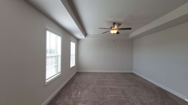 Building Photo - "Spacious 4-Bedroom Retreat with Modern Gr...