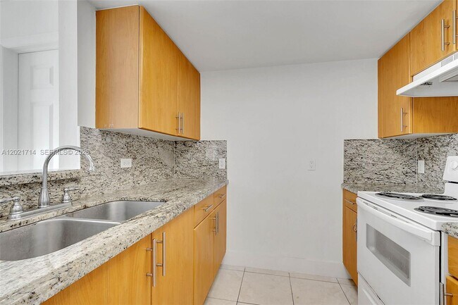 Building Photo - 1690 SW 27th Ave