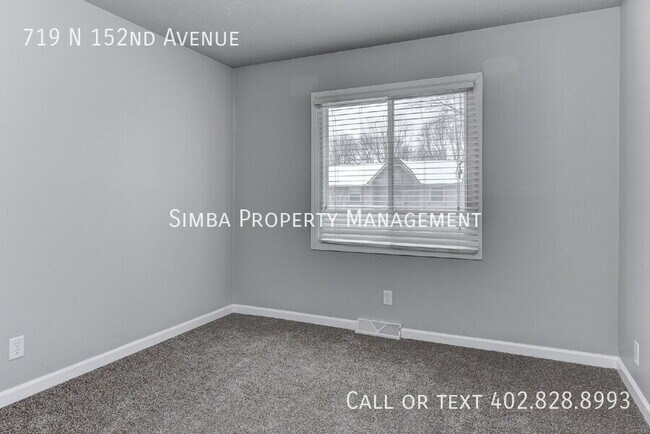 Building Photo - 719 N 152nd Ave
