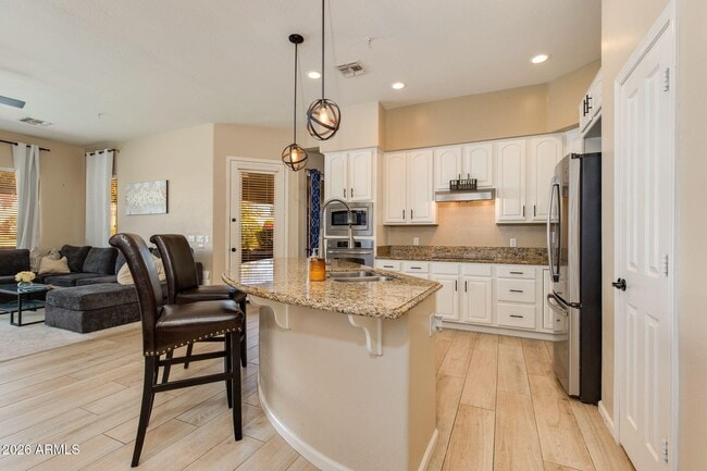 Building Photo - 7484 E Buteo Dr