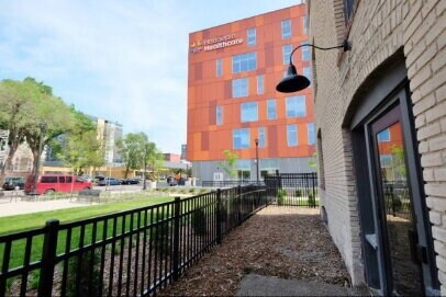 Building Photo - "Charming Studio Retreat with Hardwood Elegance in Downtown Minneapolis!"