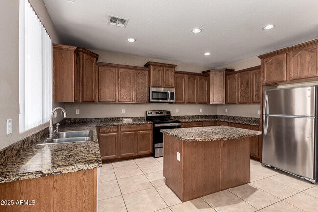 Building Photo - 7352 W Valencia Dr