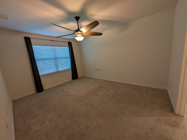 Building Photo - Modern 4-Bedroom Home with Large Backyard in Quiet SW Palm Bay – Available Mid-June