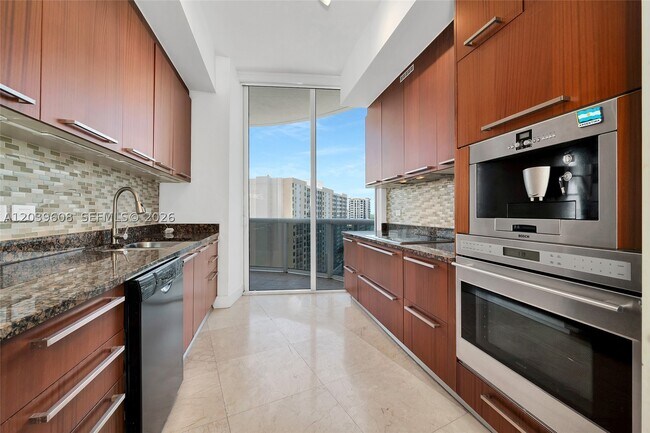 Building Photo - 16001 Collins Ave