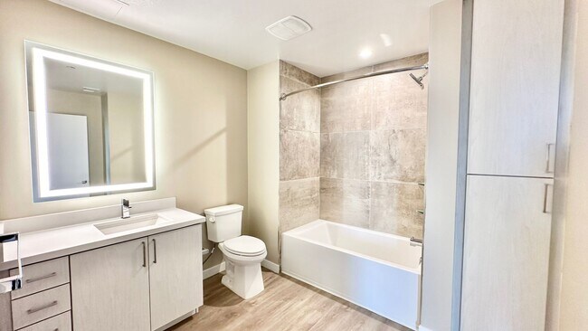 Building Photo - Live the Coastal Life- 2BR/2BA Condo Just ...