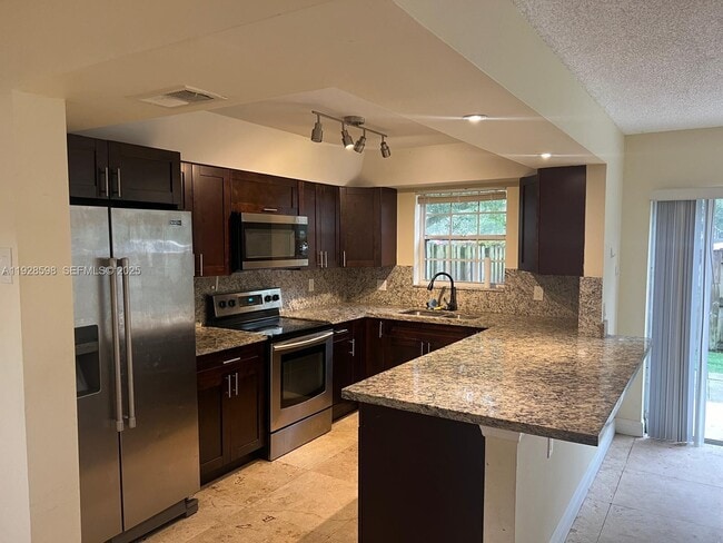 Building Photo - 4979 SW 123rd Terrace