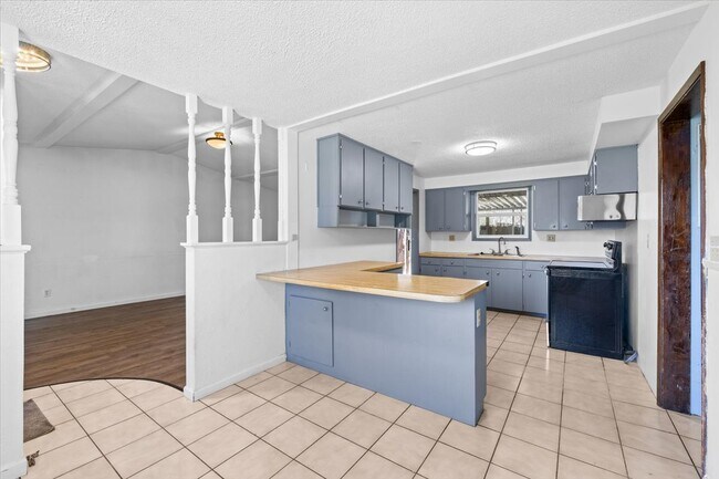 Building Photo - 7681 Garrison Ave