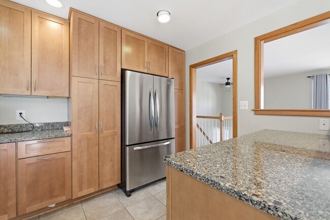 Building Photo - 5BR / 3BA Home with Flexible Living Space & Tree-Lined Views