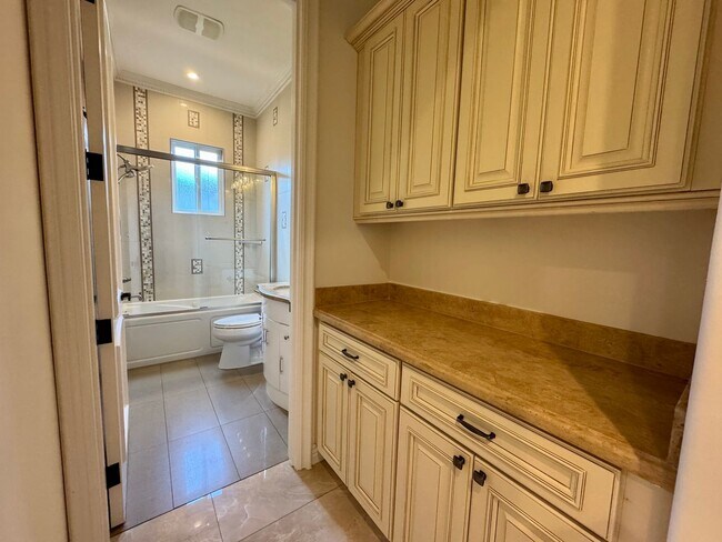 Building Photo - Peaceful North Hollywood street, charming three-bedroom, three-bathroom residence