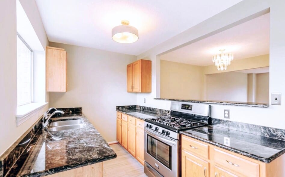 The kitchen cabinets are now while! - 4767 Kandel Ct