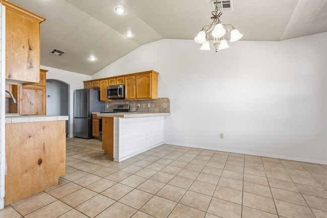 Building Photo - 4 Bedroom 2 Bath with Solar on a Large Corner Lot