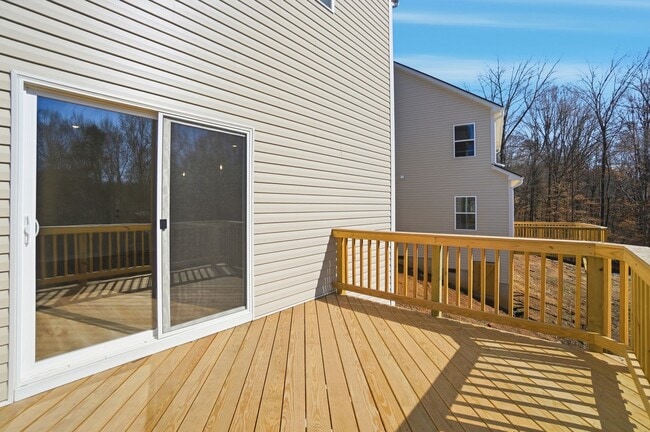 Building Photo - 4BR Home in The Pines at Paw Creek – New Construction + Private Deck