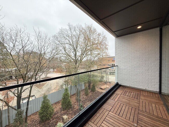 Building Photo - Luxurious New Construction 4BD, 2.5BA Raleigh Townhome with a Rooftop Terrace in a Prime Location...