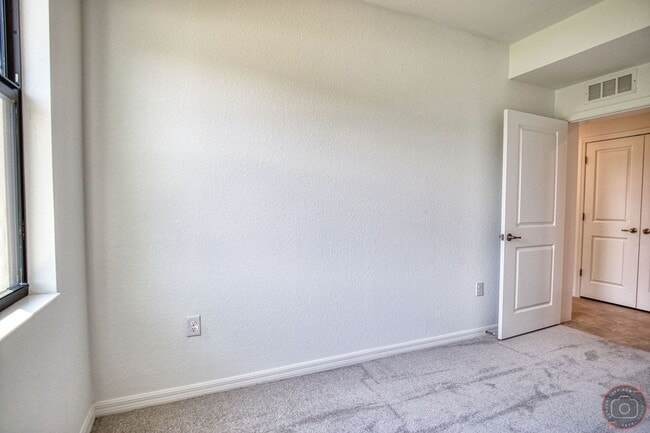 Building Photo - Annual Unfurnished Rental – New Construction Coach Home 3 Bedrooms, 2 Baths, 2 Car Garage, with R...