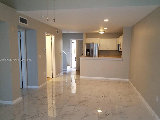 Building Photo - 4863 Via Palm Lakes