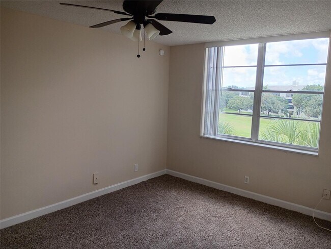 Building Photo - Stylish Remodeled Condo with Scenic Water ...