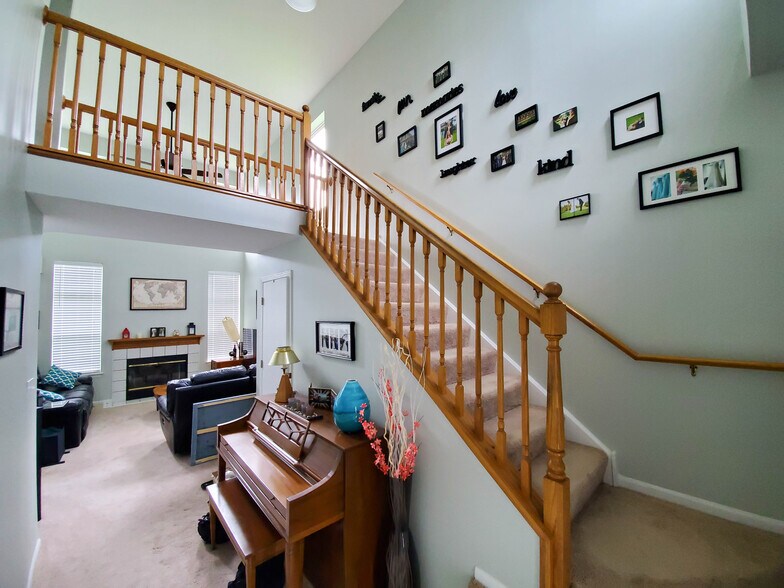 Stairs and catwalk up to master, 2nd master and laundry - 344 S Lancelot Ln