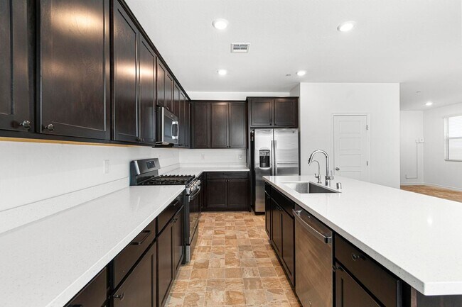 Building Photo - Modern 4-Bedroom Home in Gated Henderson Community | Built 2022