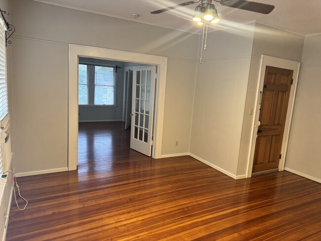 Living room into bedroom 1 and front door - 711 W French Pl