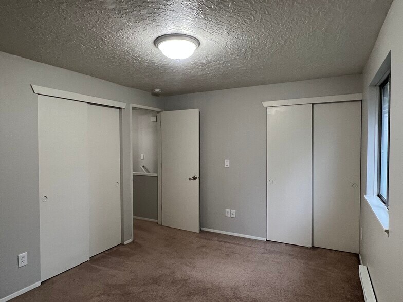 Primary bedroom with dual closets - 5119 SW 62nd Ave