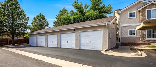 Building Photo - 3 Bed Top Floor Condo near Ft. Carson in Gated Community with detached Garage