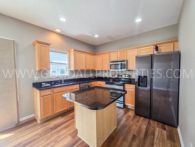 Building Photo - West Des Moines Townhome with Garden Space, Flex Room & Waukee Schools