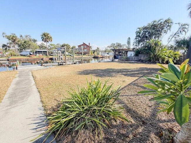 Building Photo - WATERFRONT POOL HOME ON A CANAL THAT LEADS STRAIGHT INTO TAMPA BAY - NEW DOCK AND SEAWALL COMING ...