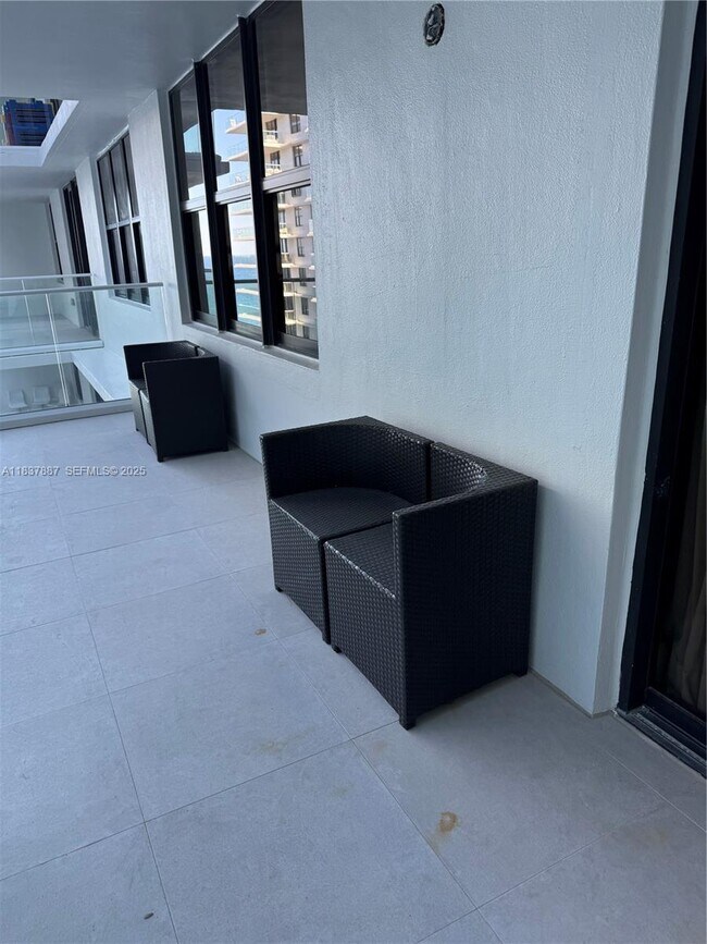 Building Photo - 9801 Collins Ave