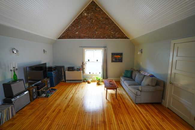 Living room view; couch is available to stay with the apartment - 536 Cumberland Ave