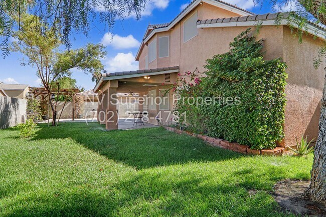 Building Photo - NW!! 4 bedrooms!! Bed & Bath DownStairs!!! RV Parking!!! Synthetic Grass Front yard!! Real Grass ...