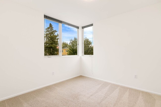 Building Photo - 3 Bedroom Modern Industrial Townhome with City Views & Rooftop Oasis