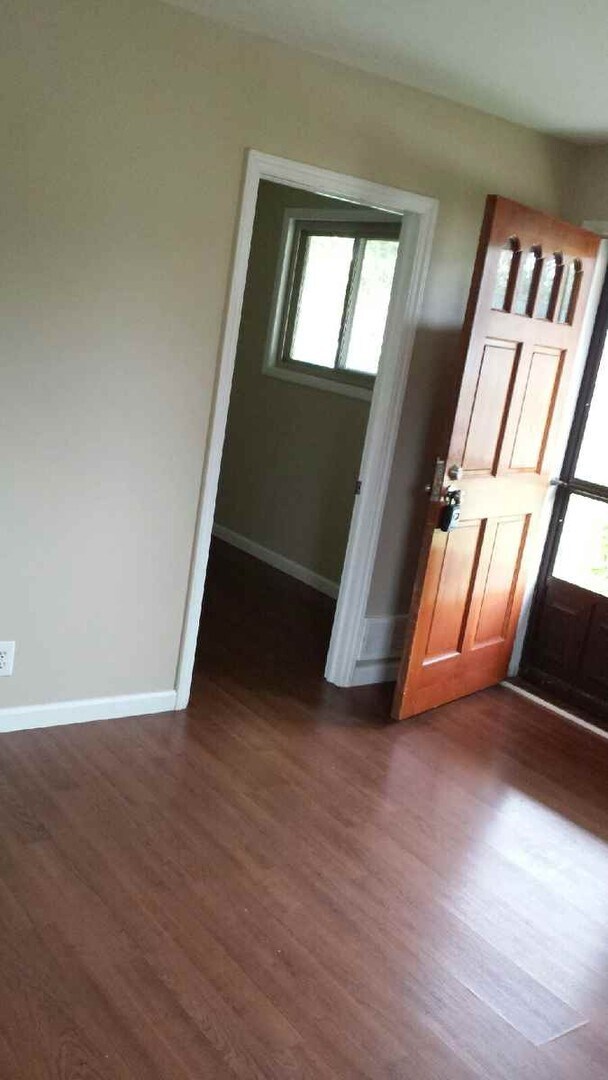 Building Photo - Three bedroom ranch with 2 car garage and large fenced in yard