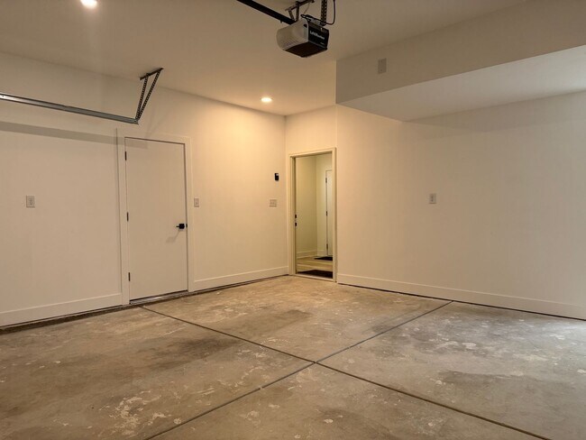 Building Photo - Vaulted Ceilings & Hardwood Floors in This Charming Indianapolis L