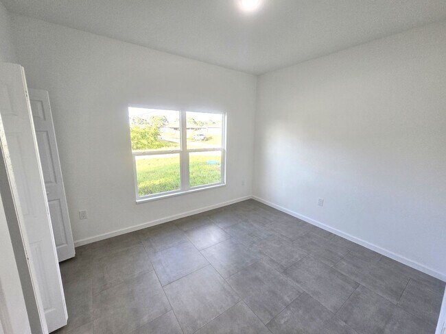 Building Photo - Brand-New 2/2/1 -SW Lehigh Acres-See this ...