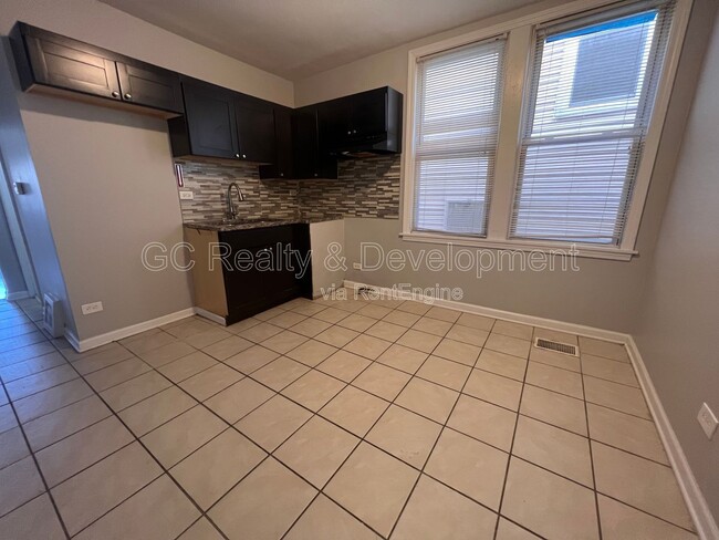 Building Photo - 8336 S Kingston Ave