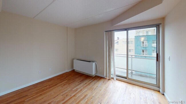 Building Photo - 102-30 Queens Blvd