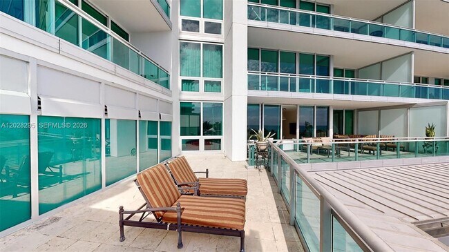 Building Photo - 10295 Collins Ave