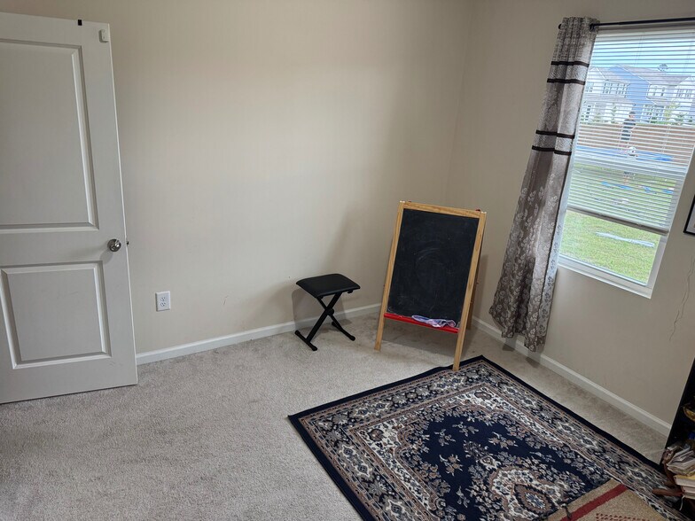 Building Photo - Room in House on Justice Union Ct